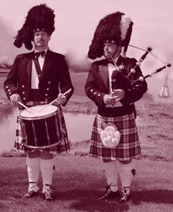 sepia tone image of a Highland bagpiper and a Highland drummer